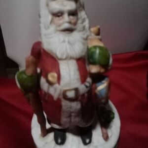 Vintage Santa Claus music box which don't work have has a tear and wear
